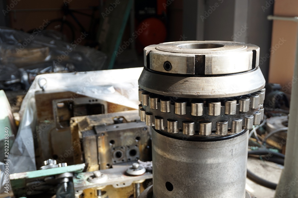 Disassembled machine with reducer, screws, bearings, worm shaft. Disassembled machine with reducer, screws, bearings, worm shaft.