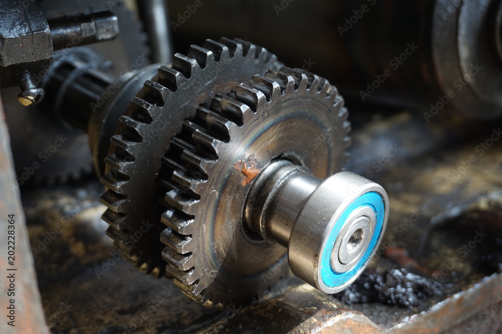 Disassembled machine with reducer, screws, bearings, worm shaft. Disassembled machine with reducer, screws, bearings, worm shaft.
