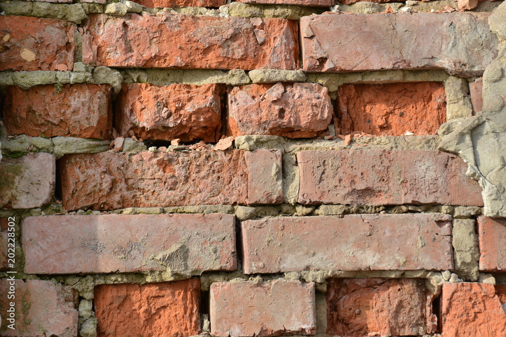 Texture of an old red brick wall Texture of an old red brick wall