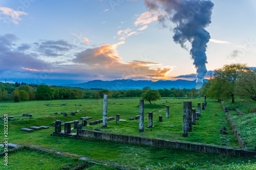 Ancient theater of Megalopolis (4th BC), the largest in Greece with a 20000 spectator capacity. Lignite fired power plants in the background produces electricity for southern Greece and the islands