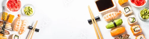 Obraz  z motywem Sushi and sushi roll set on white background.
