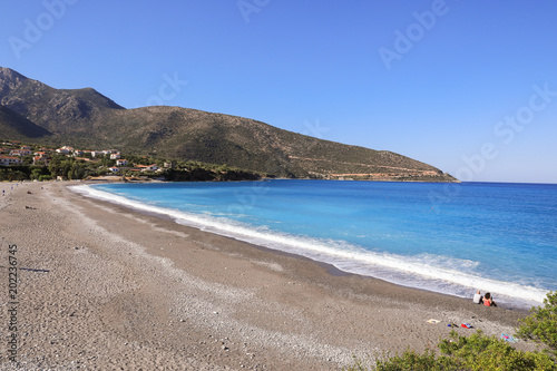 Beautiful beach of the greek village Kiparissi Lakonia, Peloponnese during summer holidays.