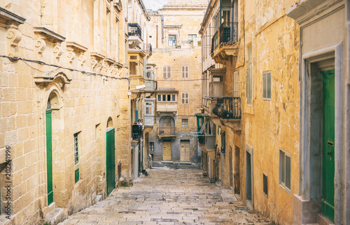 Malta, Valletta. Traditional narrow street with stairs in the city center © Rawf8