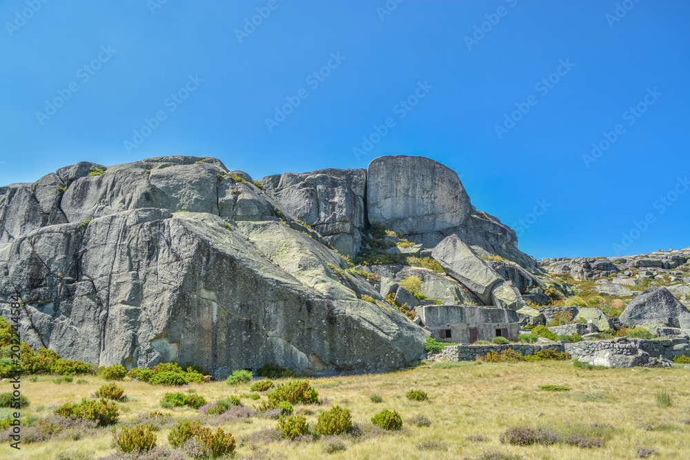 rocks on top at the mountains