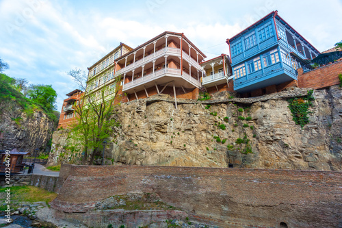 Architecture of the Old Town of Tbilisi, Georgia, in Abanotubani area. Domes of sulfur baths, carved balconies