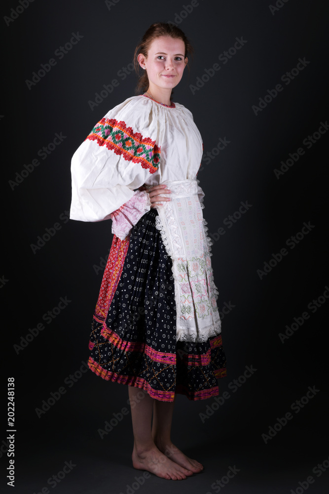 Young beautiful slovak woman in traditional costume Young beautiful slovak woman in traditional costume