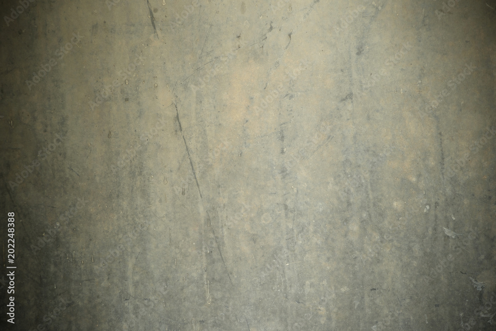 Closeup of dark grunge cement wall, for background.