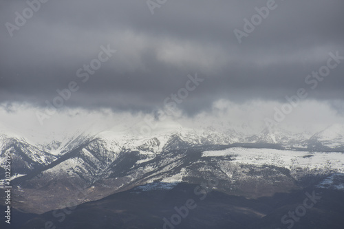 Snowy landscape with huge mountains