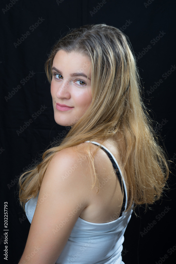 Naklejka premium portrait of young pretty cute blonde girl. Beautiful woman posing