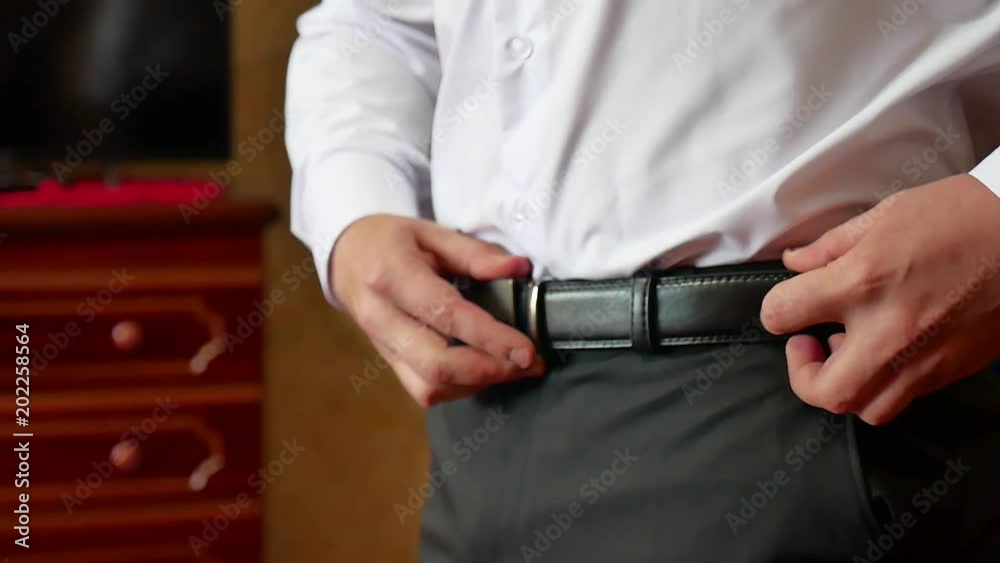 businessman dressing up man. People, business,fashion and clothing concept - close up of man dressing up and adjusting white shirt with cufflinks businessman dressing up man. People, business,fashion and clothing concept - close up of man dressing up and adjusting white shirt with cufflinks