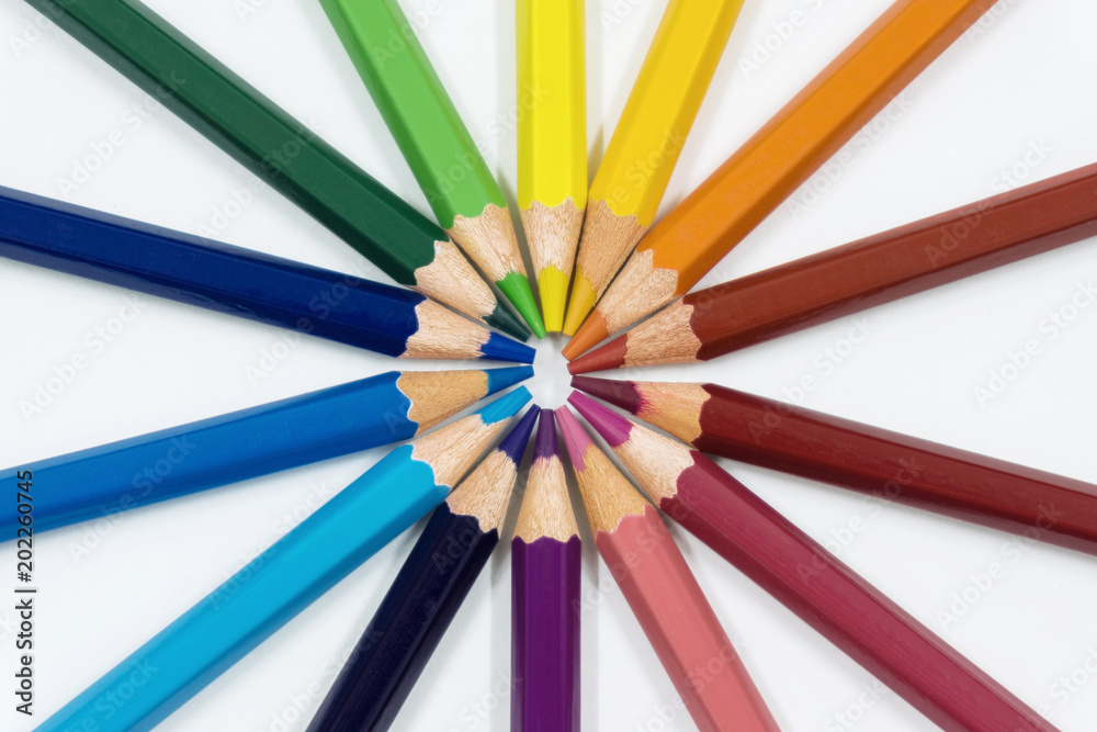Color pencils isolated on white arranged in circle. Close up. Color pencils isolated on white arranged in circle. Close up.