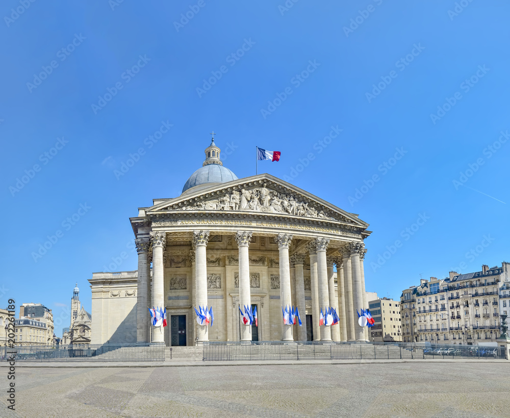 Pantheon in sunny day in Paris, France. It is a secular mausoleum containing the remains of distinguished French citizens.Located in the 5th arrondissement of Paris on the Mountain Saint Genevieve