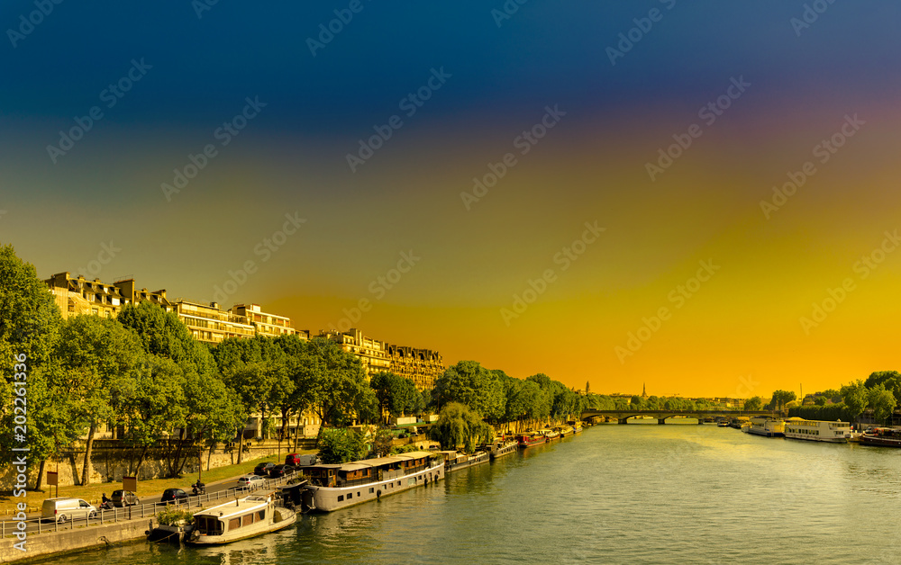 Sunrise view fo Seine river and tourist boats anchored in the Morning