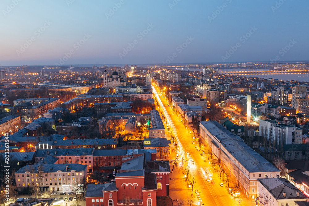 Evening Voronezh downtown. Aerial view from skyscraper roof height to Revolution prospect - central street of Voronezh