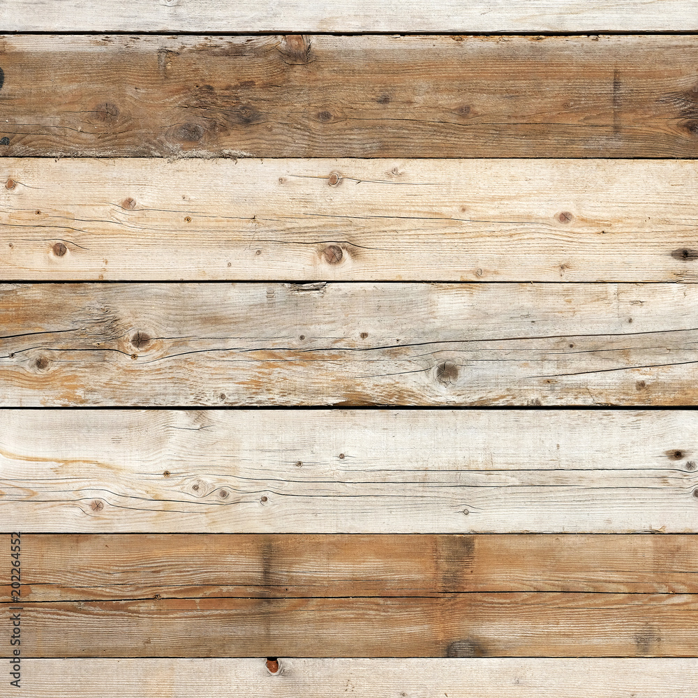 Naklejka premium Old barn wall weathered distressed faded pine wood grain wooden plank texture background surface photo square format