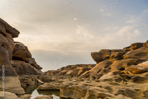 Three thousand waving the rocks beneath the Mekong river. Natural sandstone group Eroded through time for thousands of years. Ubon Ratchathani, Thailand.