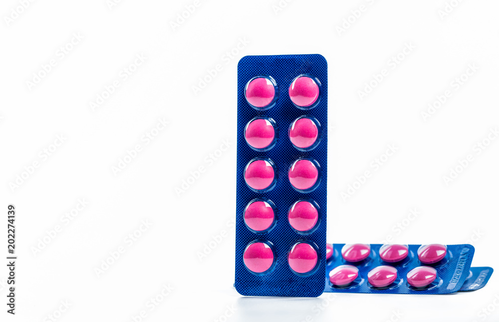Ibuprofen in pink tablet pills pack in blue blister pack isolated on white  background with copy space. Ibuprofen for relief pain, headache, high fever  and anti-inflammatory. Painkiller tablets pills. Stock-Foto | Adobe