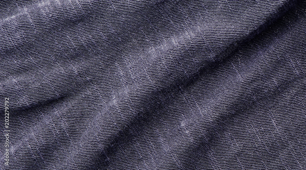 Dark fabric texture. Clothes background