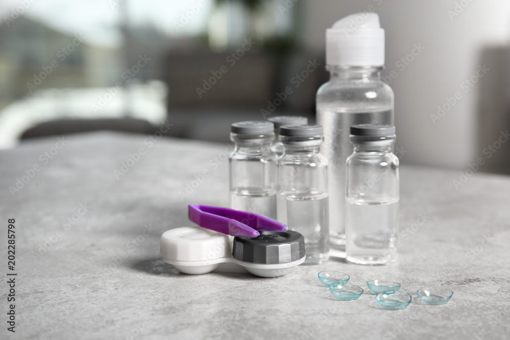 Contact lenses and accessories on table Contact lenses and accessories on table