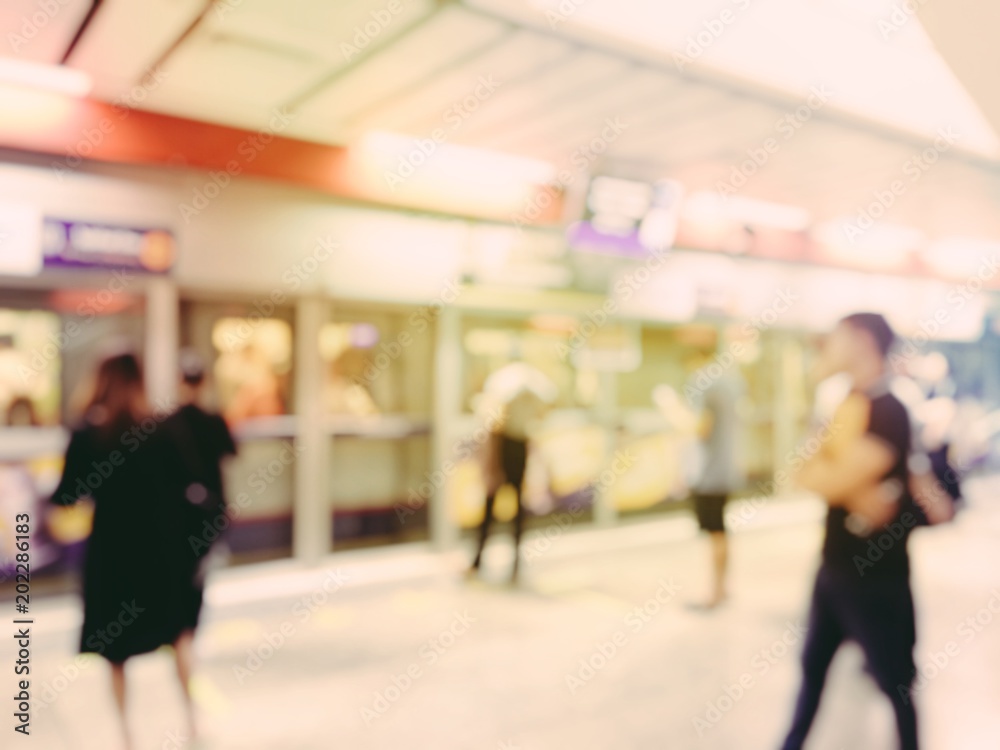 blurred image of business people, passenger or city people lifestyle inside the train subway station, transport in rush hour walk at subway station abstract blur, transportation concept. blurred image of business people, passenger or city people lifestyle inside the train subway station, transport in rush hour walk at subway station abstract blur, transportation concept.