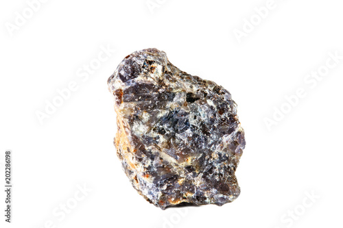 Macro shooting of natural gemstone. Raw mineral Labrador. Isolated object on a white background.