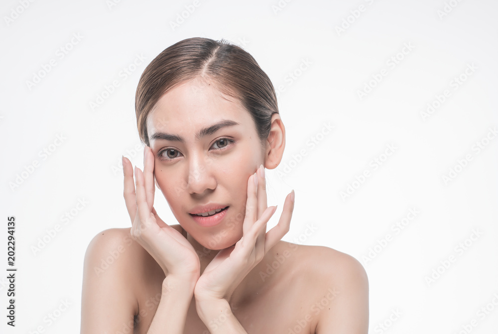 Young beautiful asia woman touching her face isolated on white background concept skincare cosmetic Young beautiful asia woman touching her face isolated on white background concept skincare cosmetic