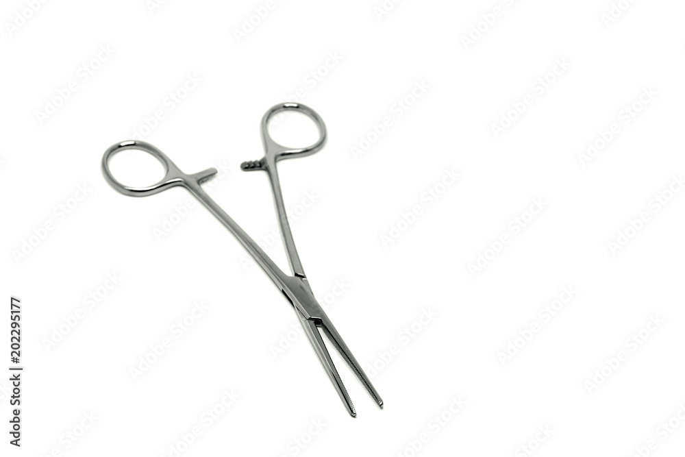 Medical clamp, surgical instrument on a white background Medical clamp, surgical instrument on a white background