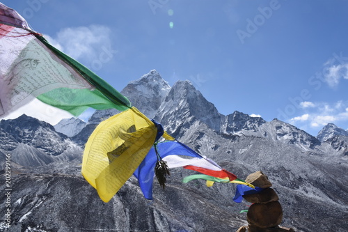 Praying flag in front of Ama Dablam, Nepal
