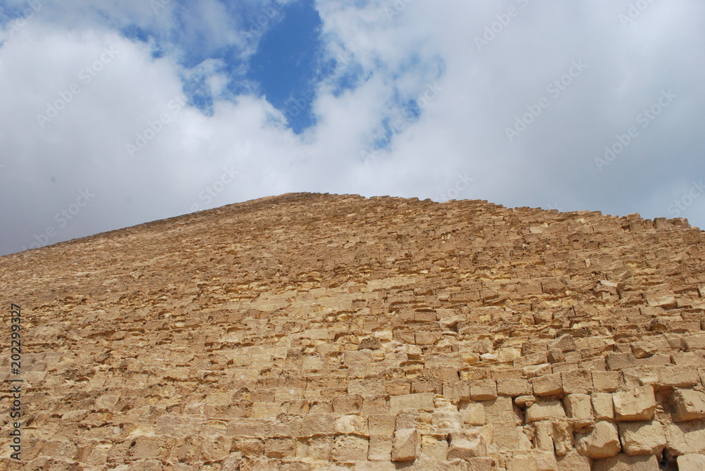 Pyramide with blue Sky and Clouds
