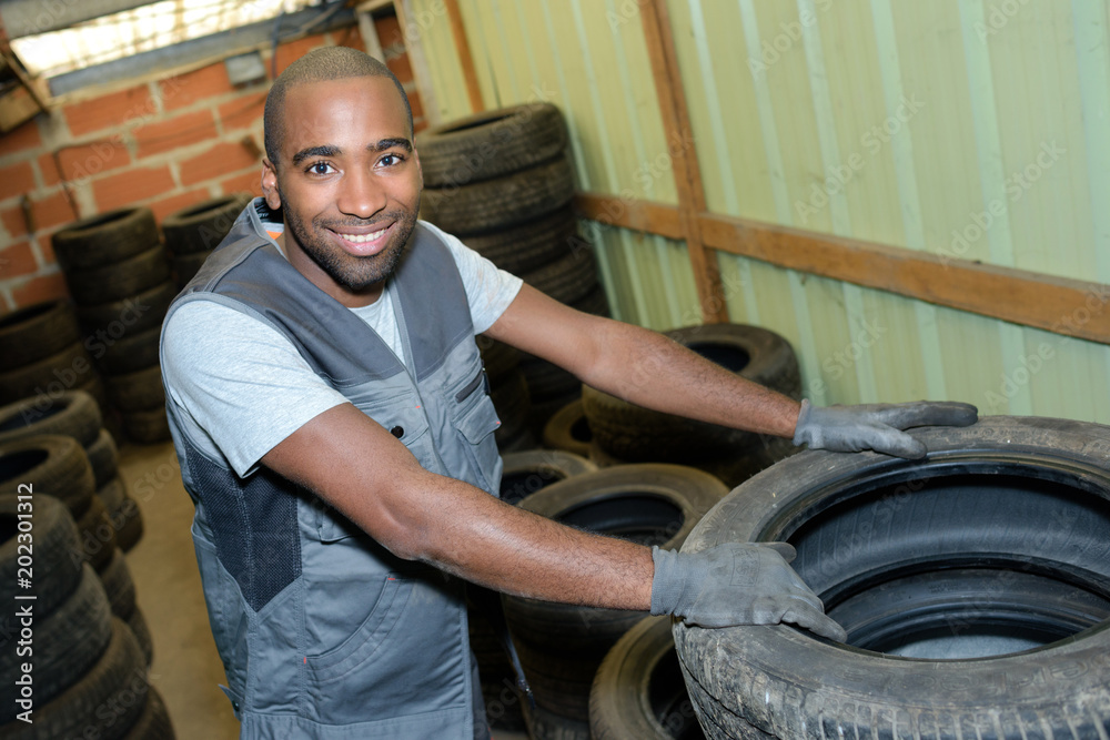 worker with tires worker with tires