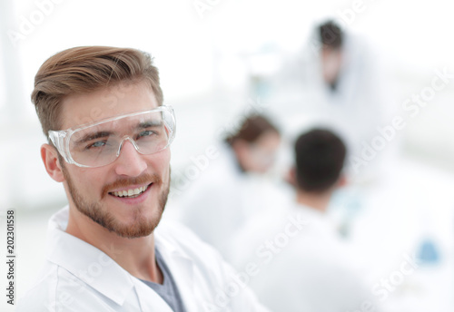 modern scientist on laboratory background