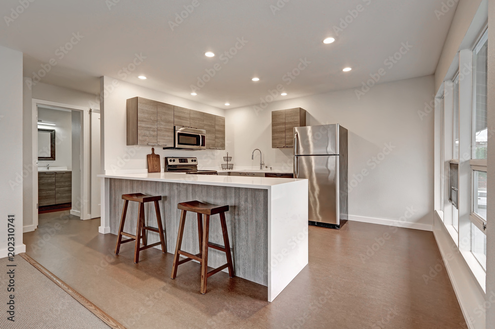 New modern apartment with grey kitchen New modern apartment with grey kitchen