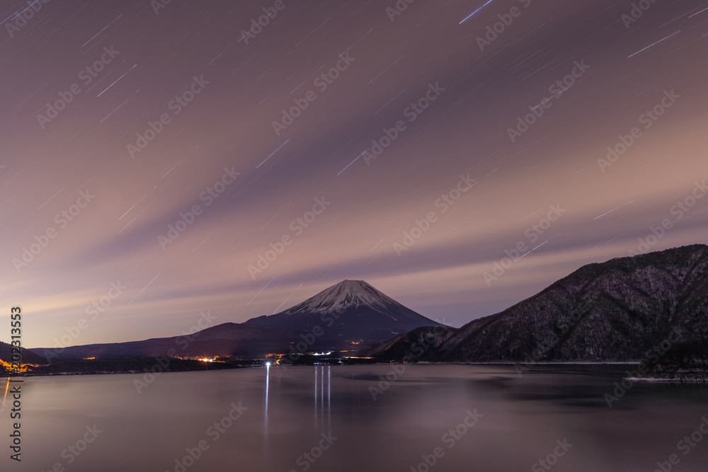 Lake Motosu and mt.Fuji at night time in winter season. Lake Motosu is the westernmost of the Fuji Five Lakes and located in southern Yamanashi Prefecture near Mount Fuji, Japan