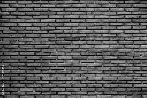 black and white old brick wall - dark background