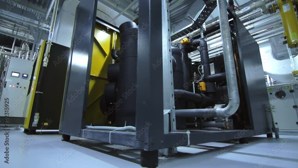 Industrial factory equipment. Factory pipeline and modern industrial equipment of production plant. Chemical factory interior. Industrial facility interior