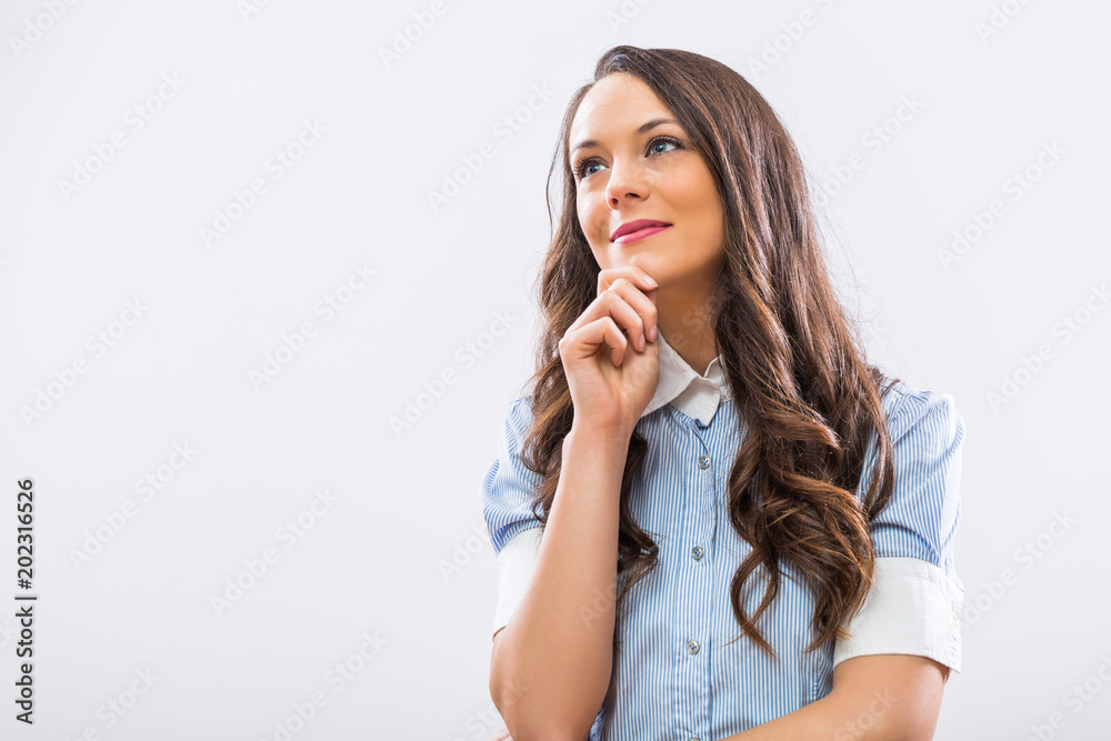 Beautiful businesswoman thinking and looking away. Beautiful businesswoman thinking and looking away.