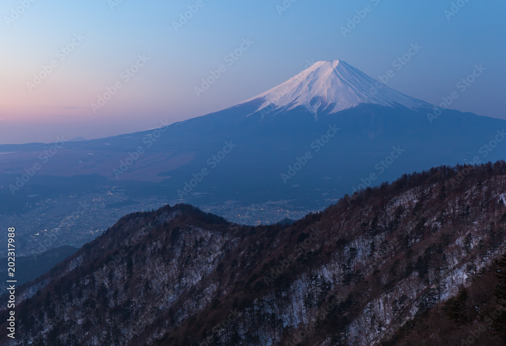 Mount Fuji during sunrise time in winter season seen from Top of Mt. Mitsutoge Mount Fuji during sunrise time in winter season seen from Top of Mt. Mitsutoge