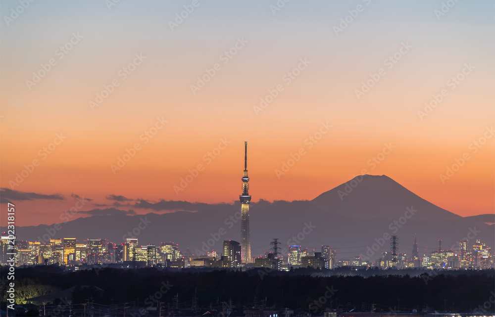 Tokyo Skytree and Mount Fuji at twilight time in winter season.