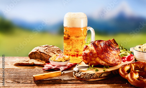 Traditional German set of food with glass of beer photo