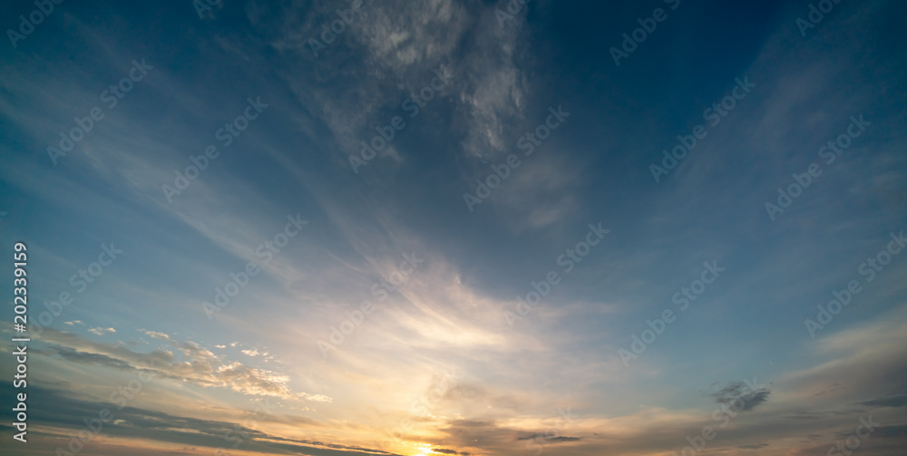 Fototapeta premium Sunset / sunrise with clouds, light rays