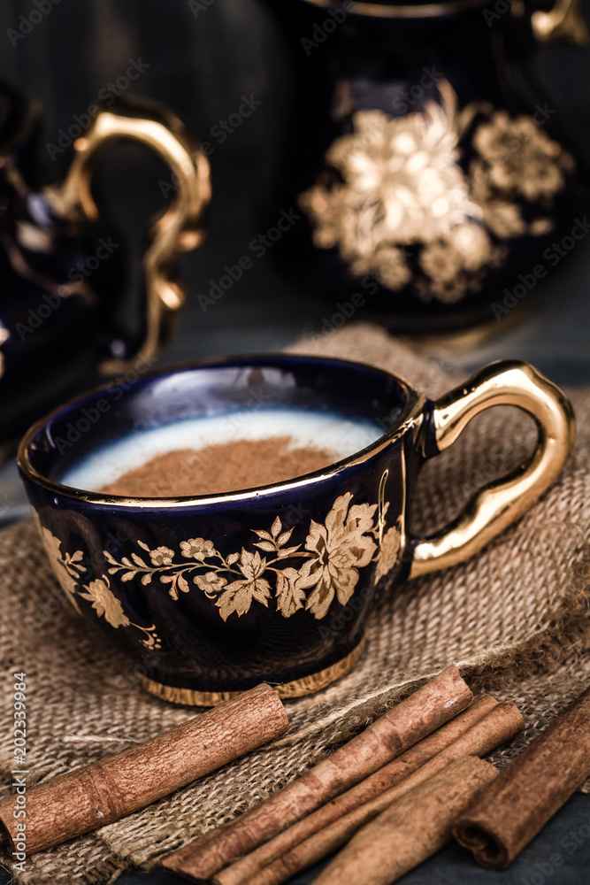 Delicious Turkish Hot Winter Drink, Sahlep Cup on Wooden Background Delicious Turkish Hot Winter Drink, Sahlep Cup on Wooden Background