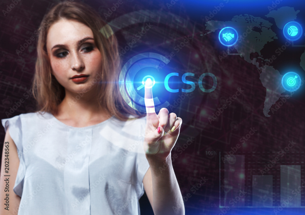 The concept of business, technology, the Internet and the network. A young entrepreneur working on a virtual screen of the future and sees the inscription: CSO The concept of business, technology, the Internet and the network. A young entrepreneur working on a virtual screen of the future and sees the inscription: CSO