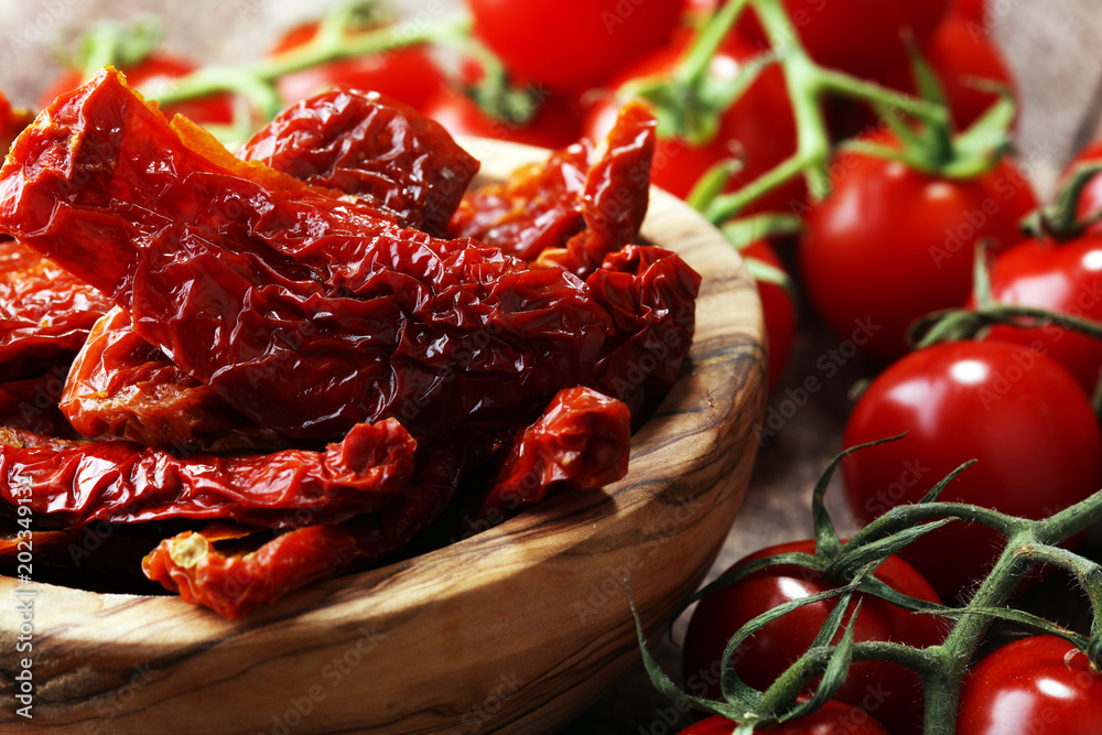 Sun dried tomatoes. tomato halves sun-dried. Sun dried tomatoes. tomato halves sun-dried.