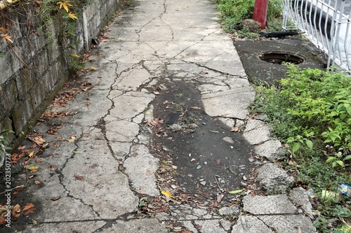 Dangerous sidewalk holes