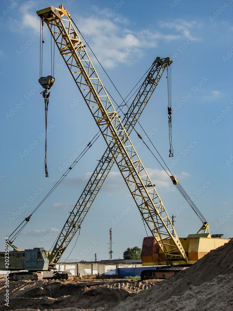Construction machinery on the construction site summer day Construction machinery on the construction site summer day