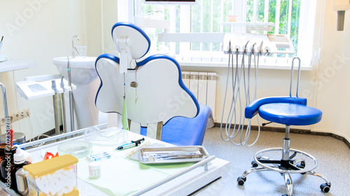 Interior of modern dental clinic with big window