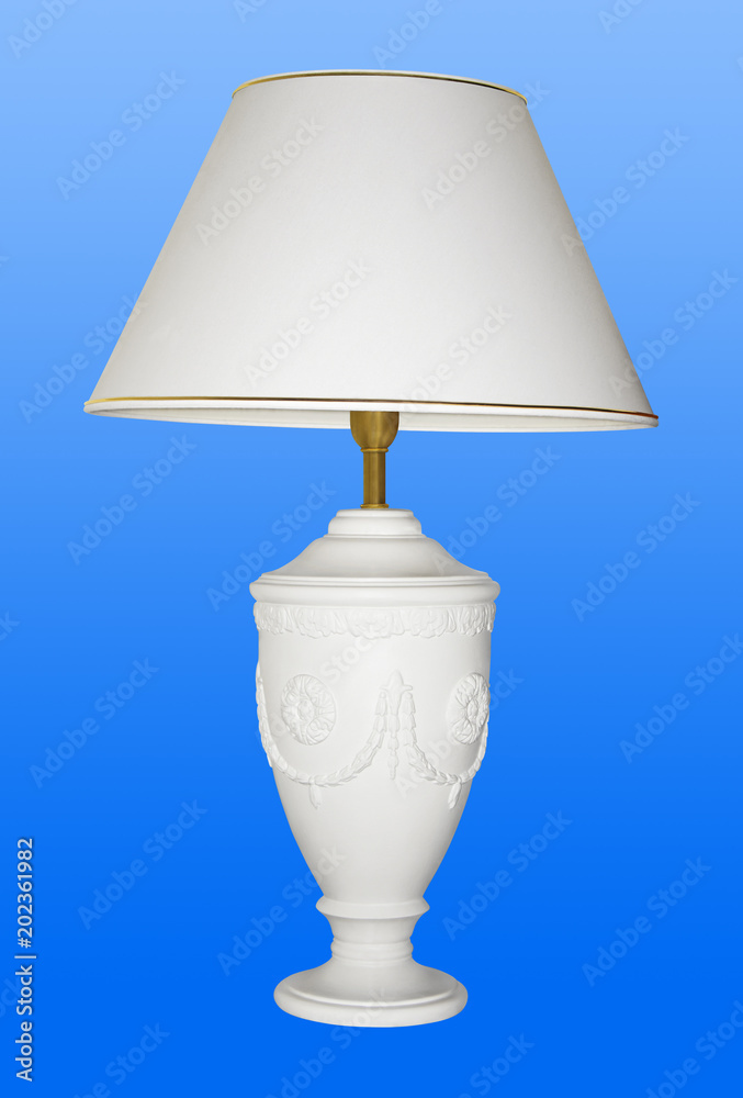 Fotografie Vintage table lamp on blue background