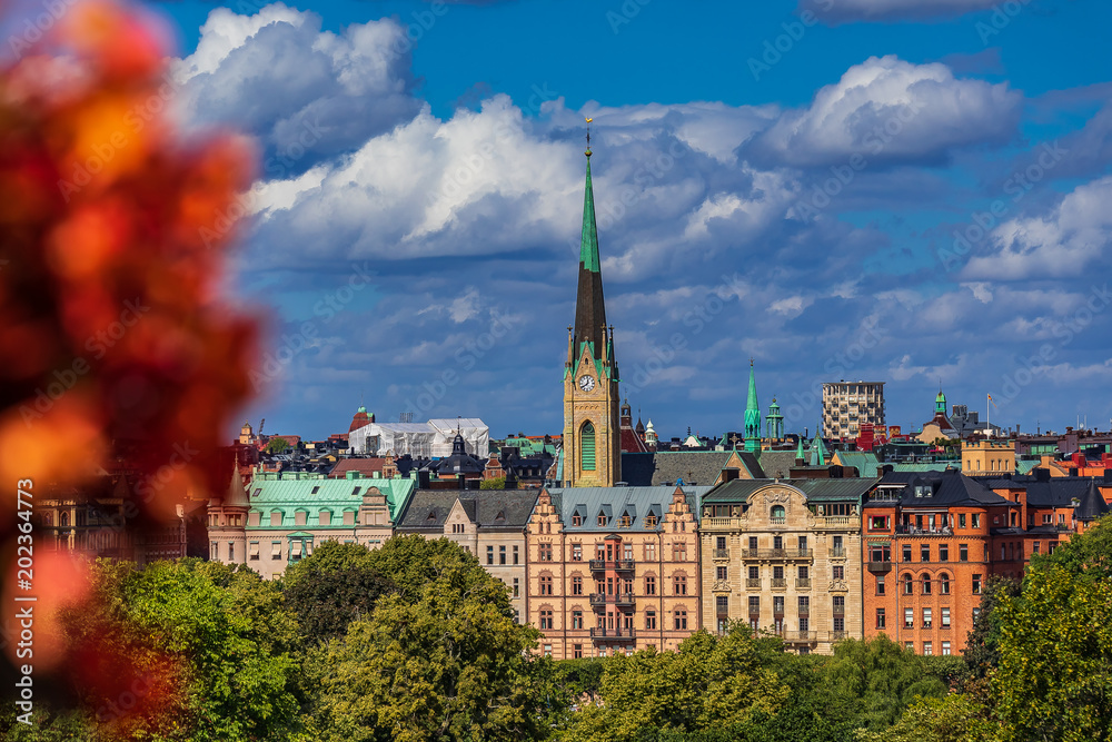 View onto traditional gothic buildings and Oscarskyrkan or Oscar's Church in Stockholm Sweden