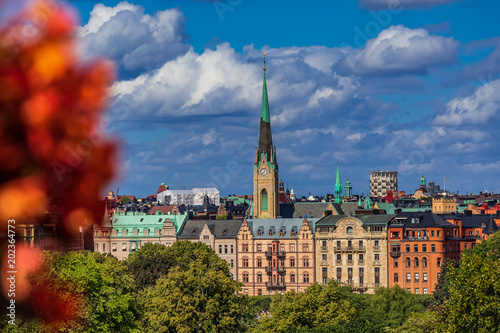 View onto traditional gothic buildings and Oscarskyrkan or Oscar's Church in Stockholm Sweden photo