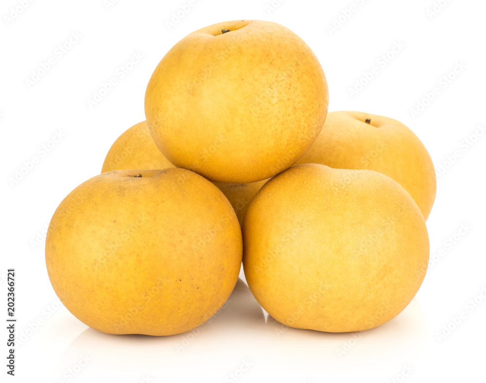 Chinese golden pears heap Nashi variety isolated on white background.